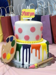 Paints and easel theme cake